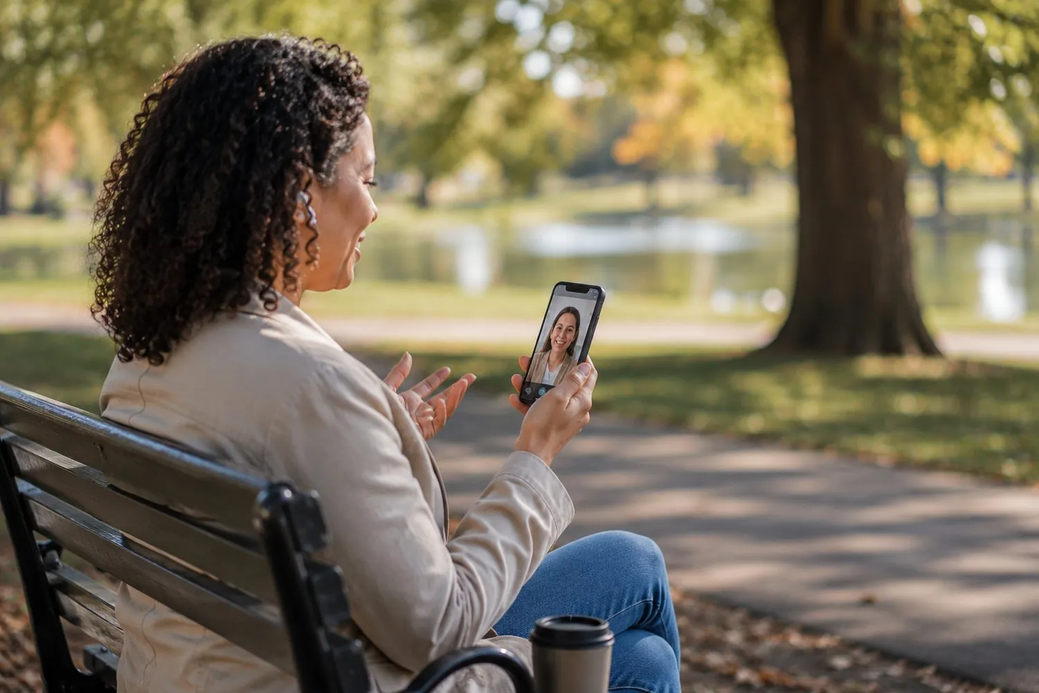 a calm therapist and adult talking by video, a warm and unhurried session